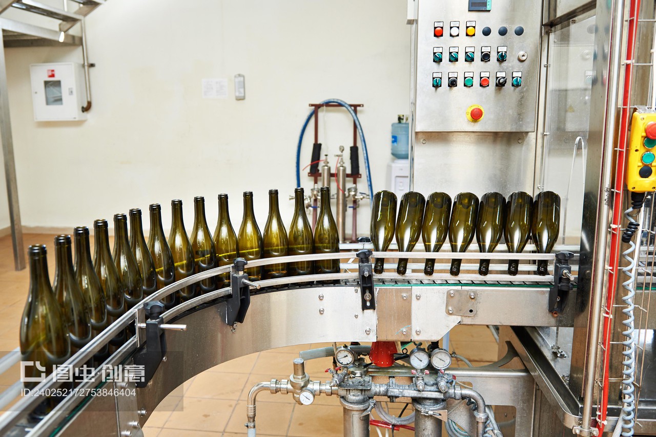 Bottling and sealing conveyor line at winery factory